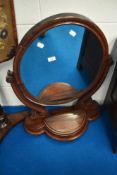 A Victorian mahogany toilet mirror with trinket storage