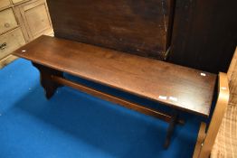 A traditional oak form style bench, approx. 137 x 33cm