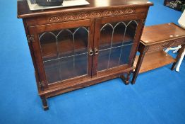 An Old Charm style low bookcase, dimensions approx. W97 D30 H92cm