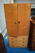 A vintage satin style sapele wardrobe, having three drawers to base, approx dimensions W81 H178cm