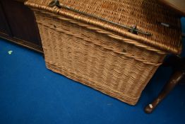 A traditional wicker laundry basket, dimensions approx. 81 x 58 x 55cm