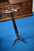 A late 19th or early 20th Century torchere stand