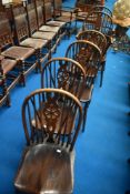 A set of six (four plus two) traditional wheelback chairs , some stamped to back TB and S Hearn