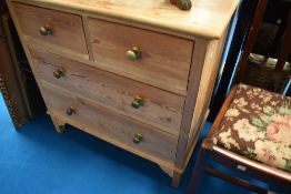 A pair of stripped pine chests of two over two drawers, each approx dimensions. W82 D46 H80cm
