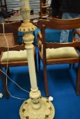 A traditional painted standard lamp