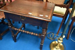 A nice quality period style oak side table having frieze drawer, dimensions approx W64 D46 H66cm