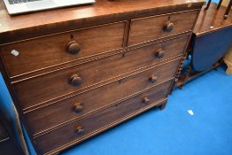 A 19th Century mahogany chest of over three drawers, significant splitting to top, dimensions