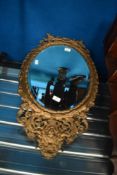 A brass frame mirror with wall or frame standing, approx 70 x 43cm