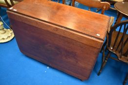 A Victorian mahogany gateleg table having full length flaps and turned legs, approx 101 x 174cm