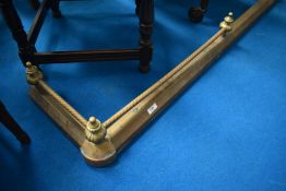 A traditional brass fire fender, internal dimensions 185 x 29cm