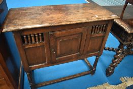 A traditional oak food cupboard on style frame, width approx 91cm