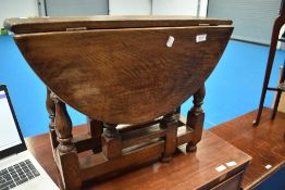 A nice quality Titchmarsh and Goodwin or similar reproduction drop leaf occasional table, width