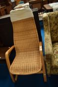 An Ikea style wicker rocker