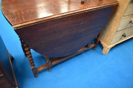 A mid 20th Century oak twist gateleg table, closed size approx. 105 x 51cm