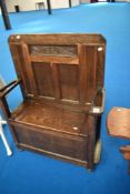 An early 20th Century oak hall seat with storage , width approx 85cm
