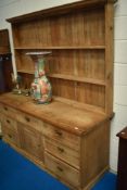 A Victorian stripped pine kitchen dresser, approx dimensions W184 D61 H204cm
