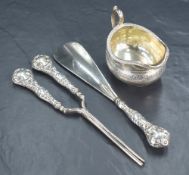 A Victorian silver milk jug, of bulbous form having a gadrooned style rim and scroll handle,