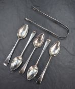A group of five George III Old English pattern teaspoons, with a matching pair of sugar tongs having