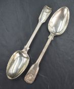 A pair of Victorian silver fiddle pattern serving spoons, having thread and shell decoration with