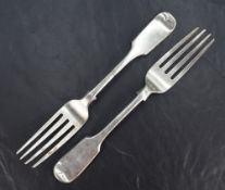 A pair of Victorian silver fiddle pattern forks, having engraved 'JEA' monogram to reverse, marks