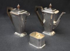 An Art Deco silver harlequin coffee set, comprising a coffee pot, hot water pot and sugar, having