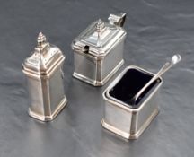 An Elizabeth II silver three-piece condiment set, comprising salt, pepperette and mustard, of canted