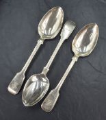 A group of three Victorian silver fiddle and thread pattern serving spoons, having thread decoration