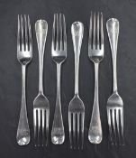 A set of six early Edwardian silver dinner forks, of Hannoverian design with engraved 'FBW' monogram