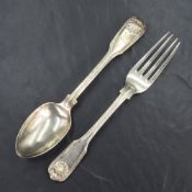 An early 19th century silver fiddle shell and thread pattern spoon and fork, having engraved