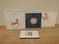 Four Royal Mint Sets, 2002 Baby Gift Set £5 Crown and Banknote YR20 02032, 2004 Baby Celebration
