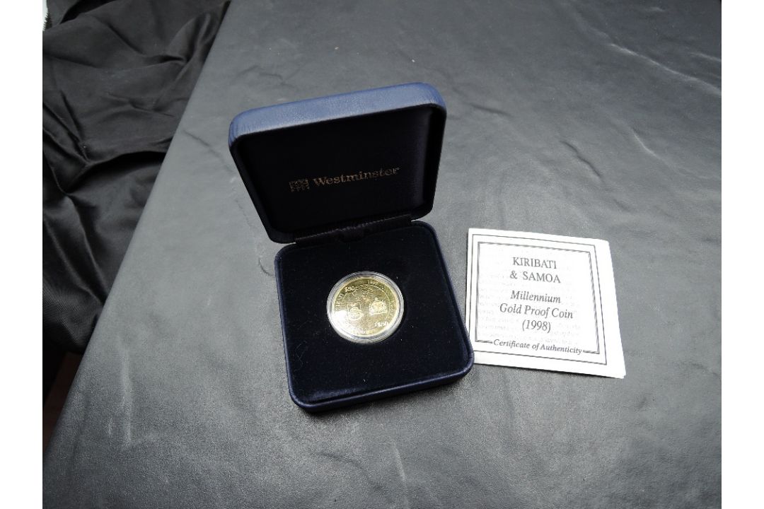 A Kiribati & Samoa Millennium Gold Proof $50 Coin in two parts, 8g of 999/1000 Gold, Westminster - Image 3 of 3