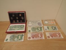A Royal Mint 1990 Proof Set in case along with an Algerian 1941 Banknote, GB 10 Shillings and One