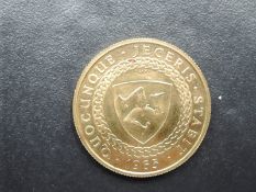 A 1965 Queen Elizabeth II Isle of Man Gold Half Sovereign, in fitted case