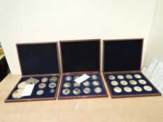 Three Windsor Mint Medallion and Decorative Coin sets, Winston Churchill 9 Item set with cert