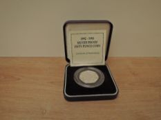 A Royal Mint 1992-1993 Silver Proof Fifty Pence Coin, in case with certificate