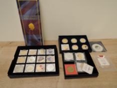 A collection of Windsor Mint decorative Coins and Medallions including 2012 Football six coin