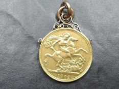 A 1902 Edward VII Gold Double Sovereign, Royal Mint having 9ct Gold Mount attached