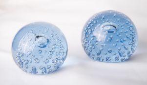 Two Whitefriars glass controlled bubble paperweights in Arctic blue, pattern number 9308 large and