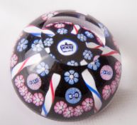 An Whitefriars glass 1977 experimental miniature Silver Jubilee Candy Twist paperweight, with
