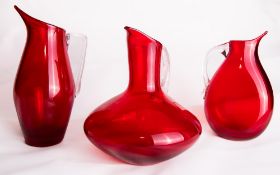 A group of three Whitefriars glass ruby red 'Sparrow Beak' jugs, comprising catalogue numbers