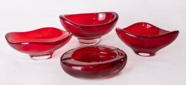 A group of three Whitefriars glass cased ruby red bowls, comprising an oval bowl catalogue number