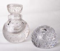 A Whitefriars glass controlled bubble inkwell, in flint, the stopper with etched number 30 to