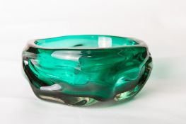 A large 1960s Whitefriars glass 'Knobbly' bowl in green, designed by William Wilson and Harry