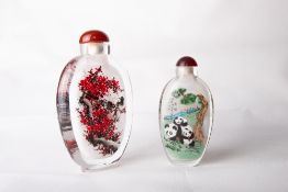 Two Chinese internally painted glass scent bottles, of ovoid form the larger painted with birds
