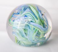 A Whitefriars glass full lead crystal 'streaky' paperweight, of un-cut dome form with three
