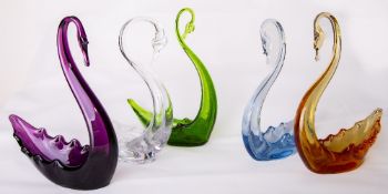 A group of six Whitefriars glass swans, medium in flint, amber, amethyst, ocean green and Arctic