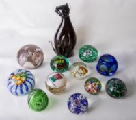 A Murano glass millefiori, lace and twist cane paperweight with central millefiori type canes