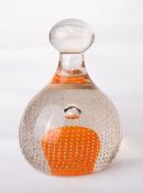 A Whitefriars glass flint encased bubble over tangerine core doorstop of rounded mallet form with