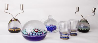A John Deacons Scottish glass millefiori paperweight, having a blue bed of multiple Clichy type rose