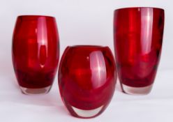 A group of three Whitefriars glass cased ruby red vases, comprising catalogue numbers 9587 (ovoid